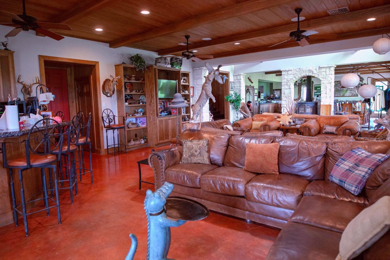 Leather seating and rustic interiors at The BigWoods lodge
